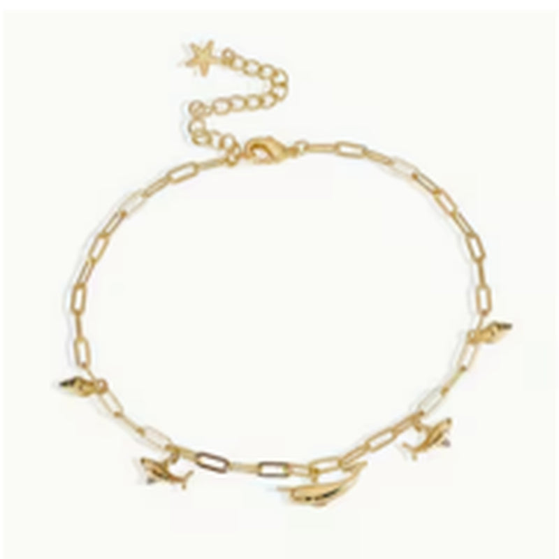 Gold-tone anklet with small ocean-inspired charms