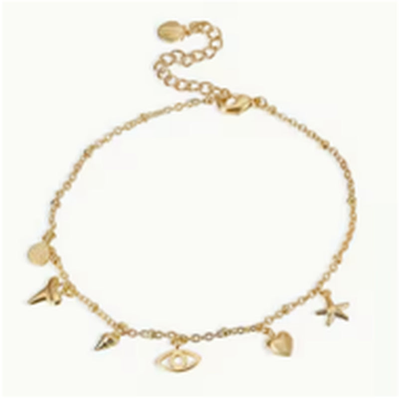 Gold-tone anklet with mixed beach-inspired charms