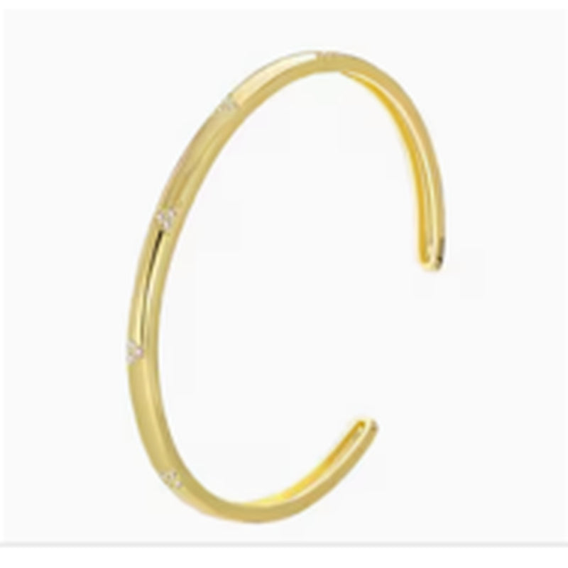 Minimal gold-tone open cuff bracelet